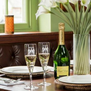 champagne flutes with family crest